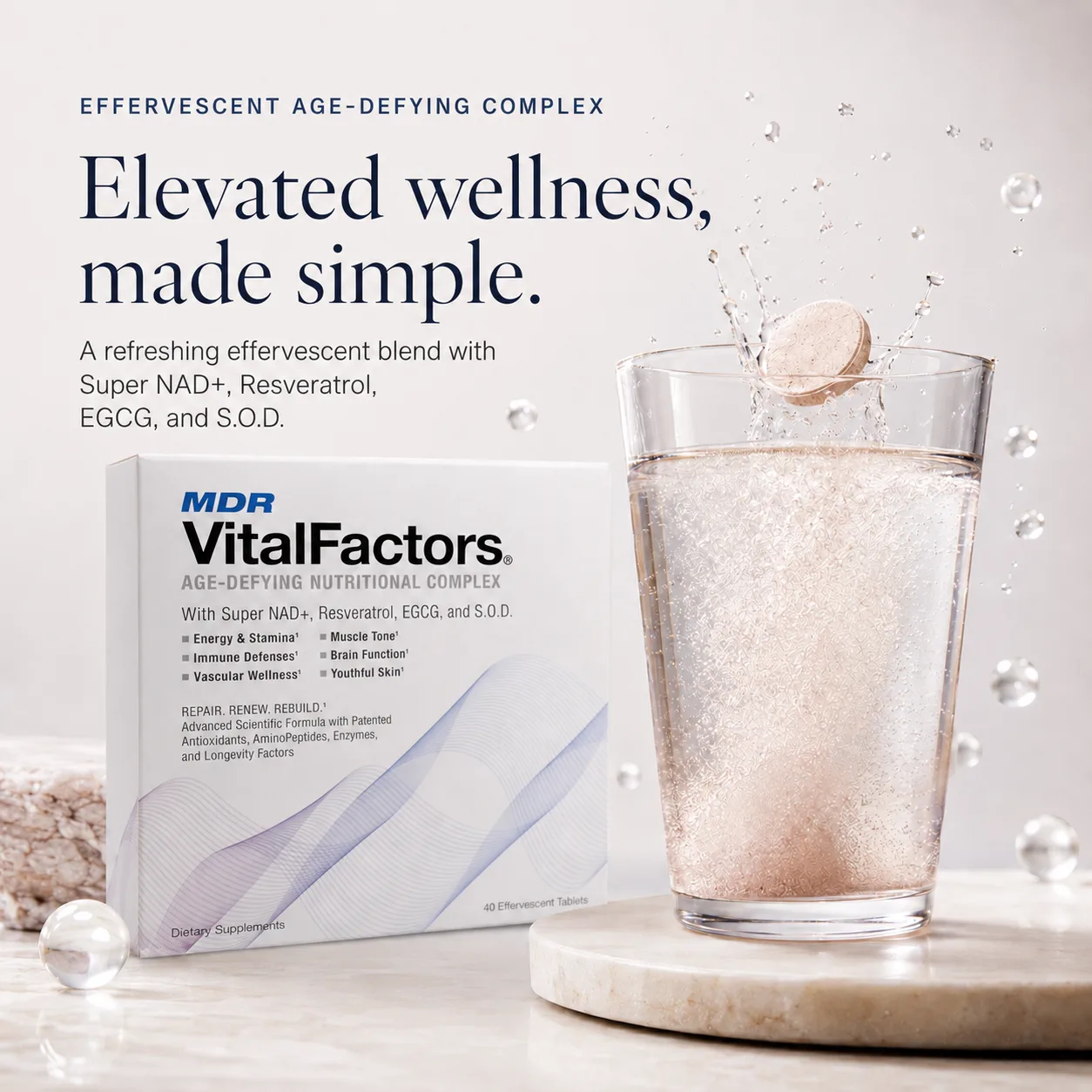 VitalFactors box beside a clear glass of effervescent water on a soft white counter